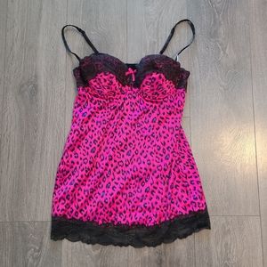 Short hot pink slip with lace trim.